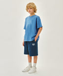 KIDS CLASSIC LOGO BERMUDA ONE TUCK SWEAT SHORTS IN BLUE image 4