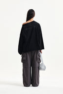 RAW HEM FINISHED BOAT NECK TOP IN BLACK image 17