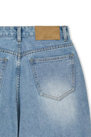 FRONT LAYERED DISTRESSED DENIM PANTS IN BLUE image 4