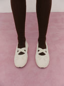 W CROSS BANDING SHEARING FLAT SHOES IN IVORY