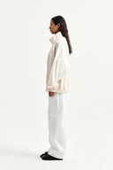 BACK LOGO HIGH NECK JUMPER IN CREAM image 8
