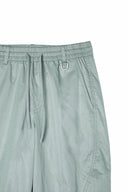 GLOSSY BANDING TRACK PANTS IN MINT image 4
