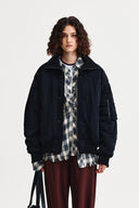 HIGH NECK BUTTON POINT ZIP UP JUMPER IN BLACK image 11