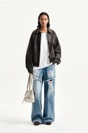SMALL LOGO FAUX LEATHER ZIP UP JUMPER IN BROWN image 9