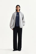 BACK LOGO HOODY WIND BREAKER IN LIGHT BEIGE image 10