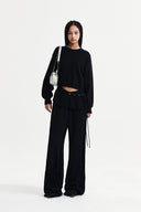 DETACHABLE SKIRT KNIT PULLOVER IN BLACK image 18