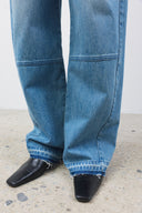 TWISTED SEAM DENIM PANTS IN BLUE image 11