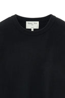 DETACHABLE SKIRT KNIT PULLOVER IN BLACK image 4