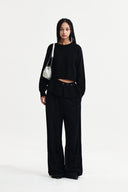 DETACHABLE SKIRT KNIT PULLOVER IN BLACK image 9