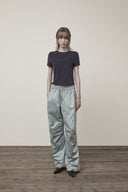 GLOSSY BANDING TRACK PANTS IN MINT image 9