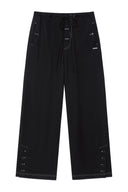 BUTTON POINT STRING WIDE PANTS IN BLACK image 1