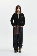CASHMERE BLENDED CUTLINE ROUND CARDIGAN IN BLACK