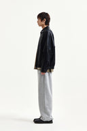 SMALL LOGO FAUX LEATHER ZIP UP JUMPER IN BLACK