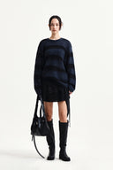 MULTI PANEL LAYERED SKIRT IN BLACK