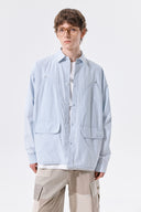WASHED COTTON DRAWSTRING SHIRT IN SKY BLUE