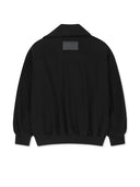 ASYMMETRIC KNIT PANEL JUMPER IN BLACK