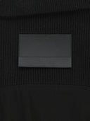 ASYMMETRIC KNIT PANEL JUMPER IN BLACK