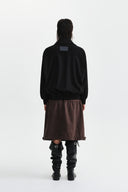 ASYMMETRIC KNIT PANEL JUMPER IN BLACK