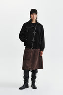ASYMMETRIC KNIT PANEL JUMPER IN BLACK