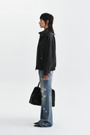 SMALL LOGO FAUX LEATHER HIGH NECK JUMPER IN DARK BROWN