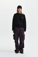 BACK LOGO RAW CUT BOAT NECK TOP IN BLACK