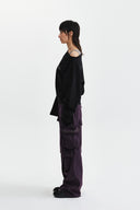 BACK LOGO RAW CUT BOAT NECK TOP IN BLACK