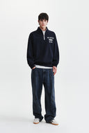 MATIN LOGO QUARTER ZIP UP IN NAVY