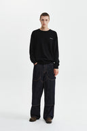 CALLIGRAPHY BACK LOGO KNIT PULLOVER IN BLACK