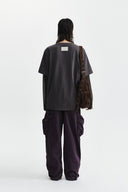 GRAFFITI ARTWORK LAYERED TOP IN CHARCOAL GREY