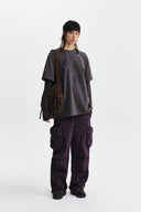 GRAFFITI ARTWORK LAYERED TOP IN CHARCOAL GREY