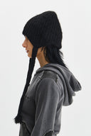 TASSEL TIE KNIT BEANIE IN BLACK