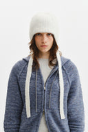 TASSEL TIE KNIT BEANIE IN IVORY