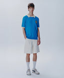 M OUT POCKET DENIM SHORTS IN IVORY image 1