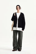 BACK LOGO LINE POINT KNIT CARDIGAN IN BLACK image 9