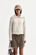 BOUCLE KNIT ZIP UP CARDIGAN IN LIGHT BEIGE image 1