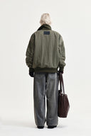 HIGH NECK BUTTON POINT ZIP UP JUMPER IN KHAKI image 6