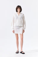 MESH LOGO WRAP MINI SKIRT IN WHITE image 8