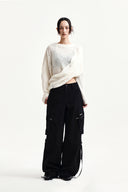ASYMMETRIC DAMAGED KNIT PULLOVER IN IVORY image 9
