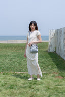 SLIT BUTTON POINT CROP TOP IN IVORY image 19