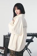 BACK LOGO HIGH NECK JUMPER IN CREAM image 12