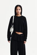 DETACHABLE SKIRT KNIT PULLOVER IN BLACK image 10