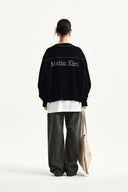 BACK LOGO LINE POINT KNIT CARDIGAN IN BLACK image 8